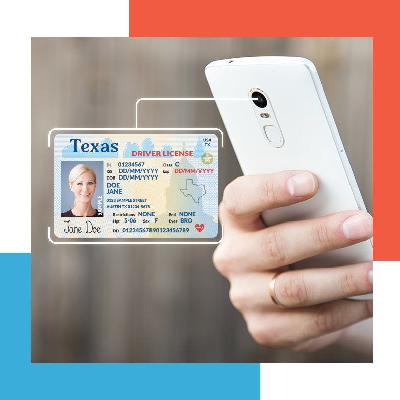 A hand holding a phone with an ID showing on the side.